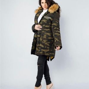 Brand new, never worn Milano winter coat.